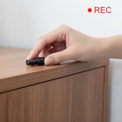 caméra de chasse sur une commode